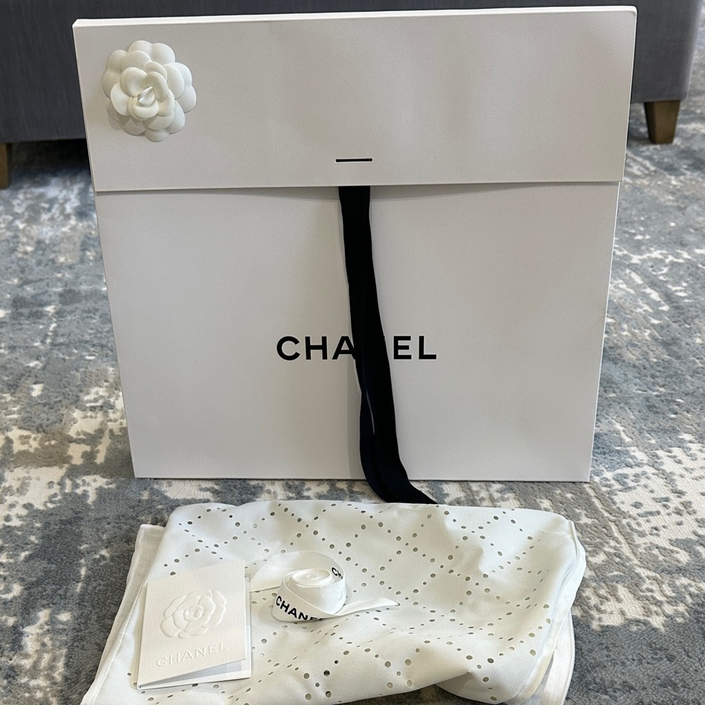 Chanel white shopping merchandise